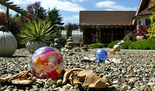 Fish and artwork share a small pond. Photo by Stephanie S. Cordle